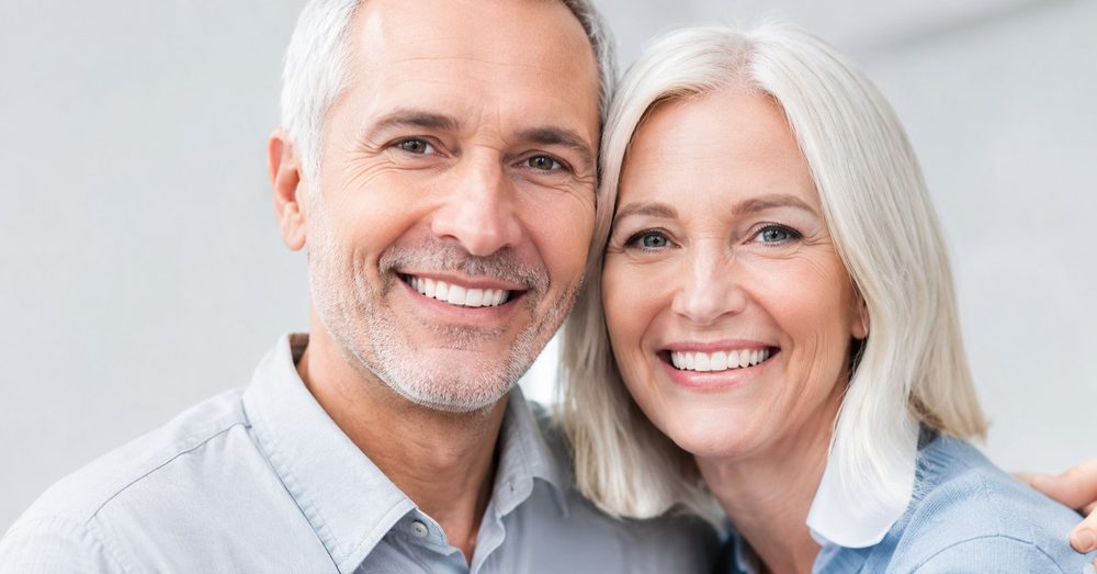 A smiling older couple
