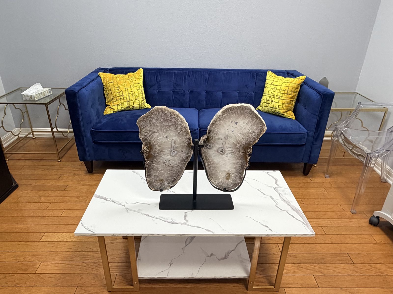 Navy velvet sofa in the patient lounge